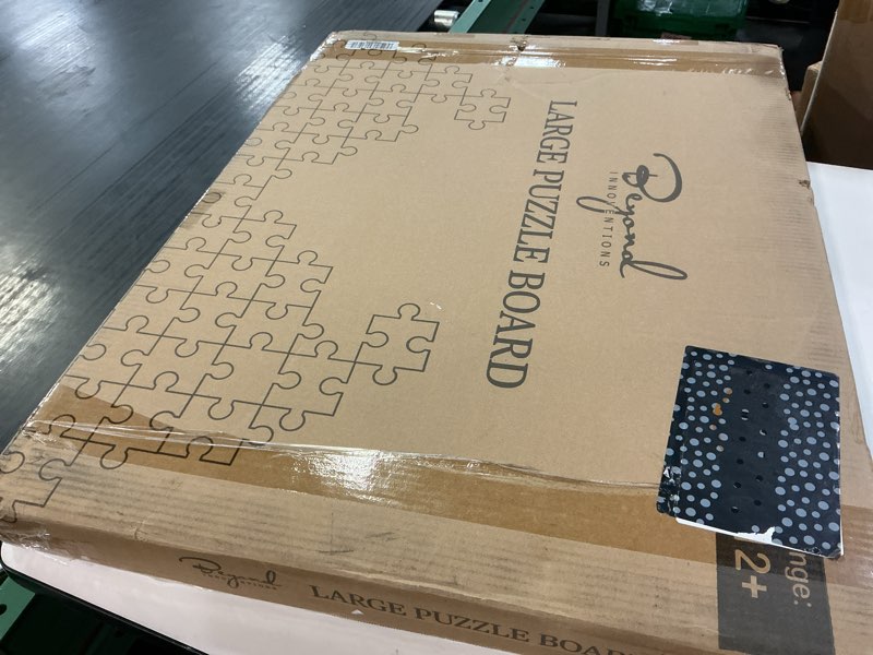 Condition photo showing New/Like New for 1000 piece rotating puzzle board with drawers and cover - 4 drawers, wooden jigsaw puzzle table | 30” x 22”| jigsaw puzzle board - portable puzzle tables for adults and kids by beyond innoventions