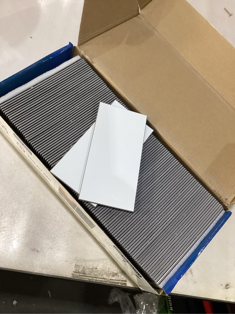 Condition photo showing New/Like New for Art3d 102-Piece Peel and Stick Wall Tile for Kitchen Backsplash, Bathroom, Fireplace, 3in. × 6in. Stick on Subway Tile, Glossy White 3" X 6“ Glossy White 102