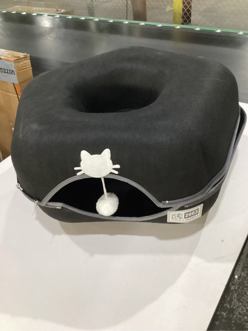Condition photo showing New/Like New for Cattasaurus Peekaboo Cat Cave Donut for Multiple & Large Cats up to 30-45 lbs, 3-in-1 Self Warming Cat Bed, Tunnel & Scratcher for Indoor Cats, Washable & Detachable Small Dog Bed, black SIMILAR TO STOCK PHOTOS