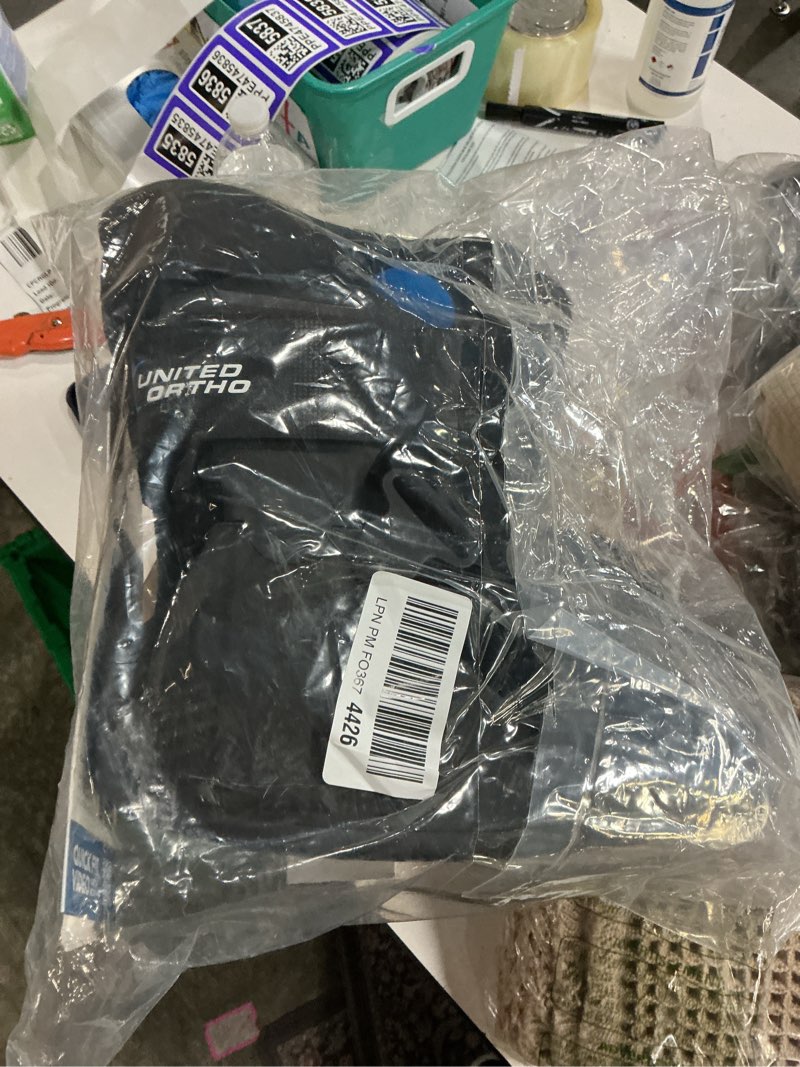 Condition photo showing New/Like New for united ortho short air cam walker fracture boot, small, black black small boot