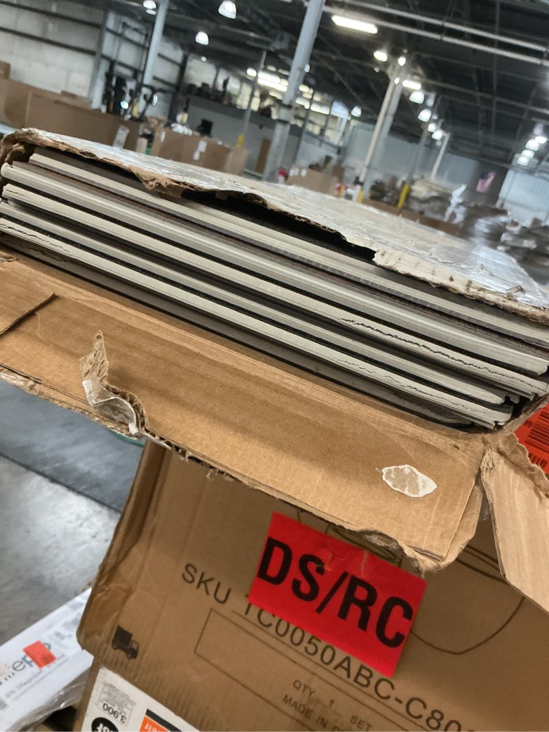 Condition photo showing As Is for allure marble cake mahogany extra long 22 mil rigid core luxury vinyl plank flooring