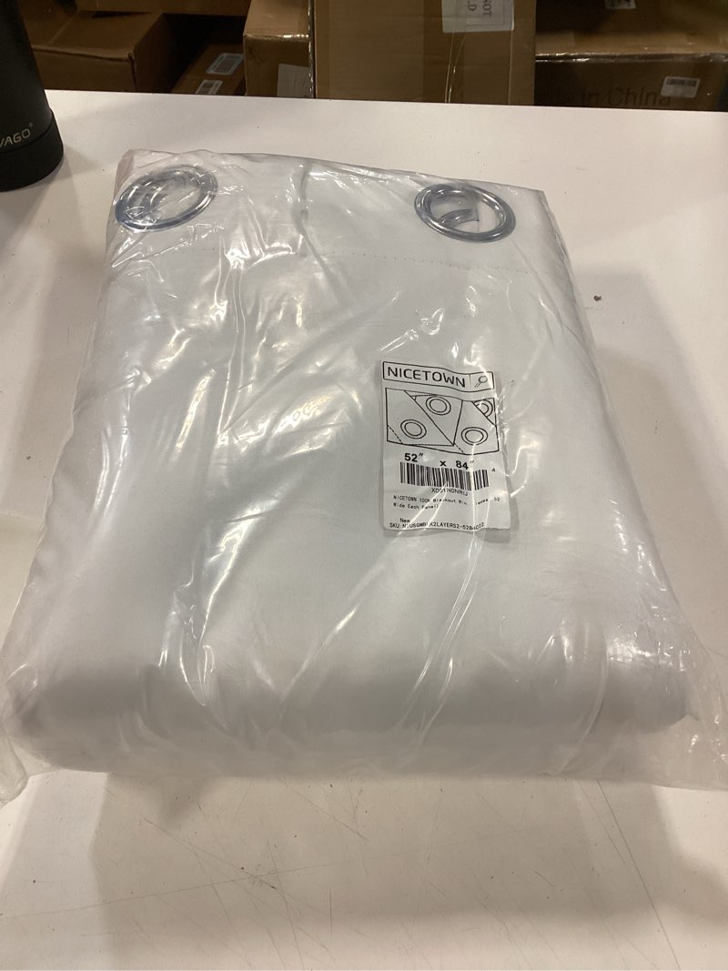 Condition photo showing New/Like New for nicetown 100% blackout window curtain panels, cold and full light blocking drapes with black liner for nursery, 84 inches drop thermal insulated draperies (white, 2 pieces, 52 wide each panel) pure white 52"w x 84"l (pack of 2)
