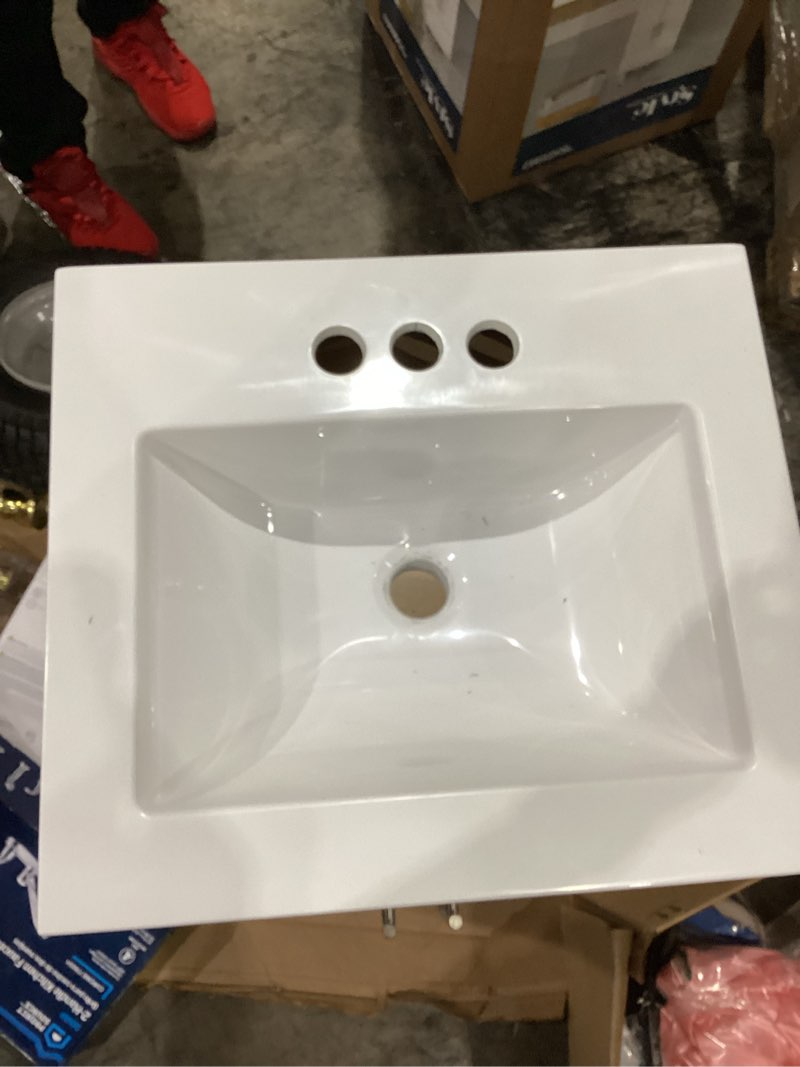 Condition photo showing As Is for style selections kirkman 18-in white single sink bathroom vanity with white cultured marble top