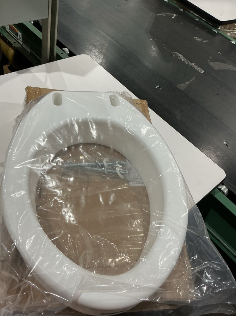 Condition photo showing As Is for carex toilet seat riser, elongated raised toilet seat adds 3.5 inches to toilet