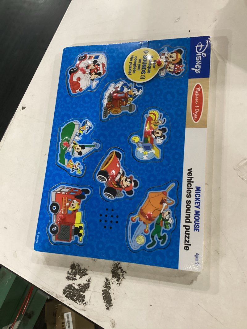 Condition photo showing New/Like New for melissa & doug disney mickey mouse and friends vehicles sound puzzle (8 pcs) pack of 1