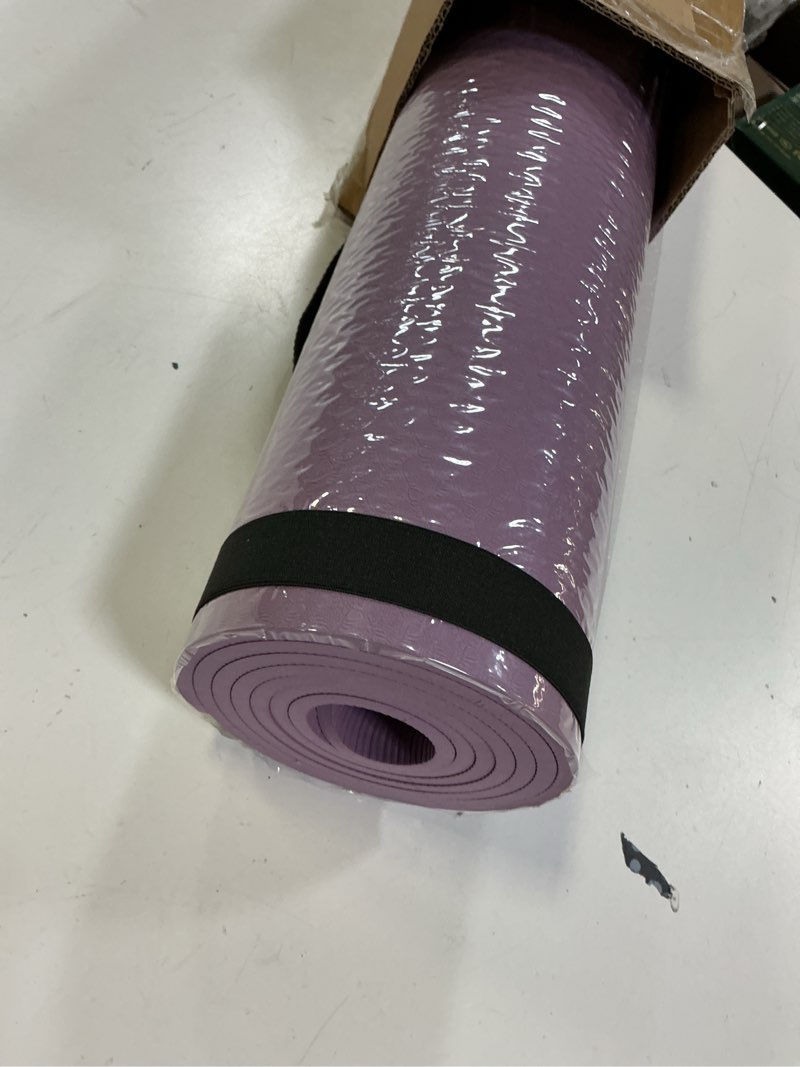 Condition photo showing New/Like New for amazon basics 1/4 inch thick tpe exercise yoga mat with carrying strap plum