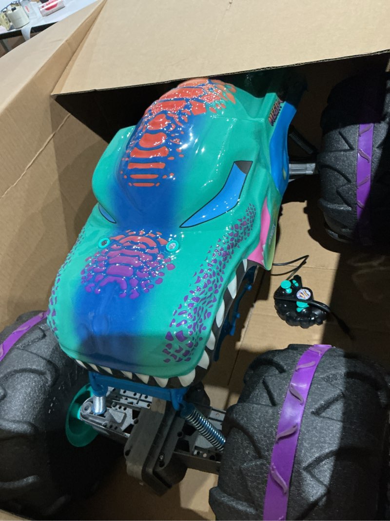 Condition photo showing As Is for hot wheels rc monster trucks mega-wrex in 1:6th scale, extra large remote-control toy truck, more than 2ft long multicolor