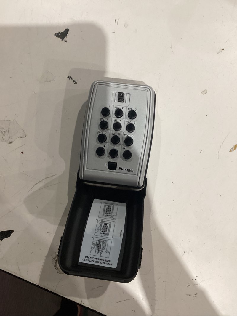 Condition photo showing As Is for master lock push button lock box