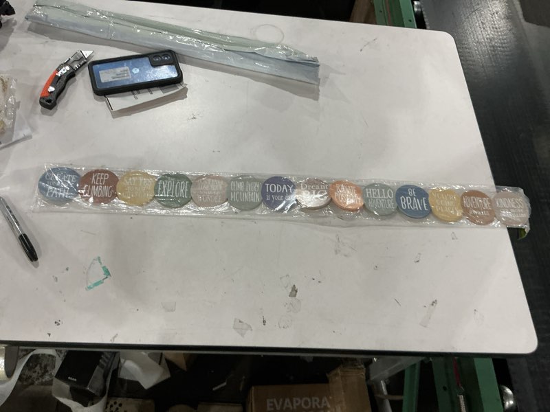 Condition photo showing New/Like New for Teacher Created Resources Moving Mountains Positive Sayings Die-Cut Border Trim