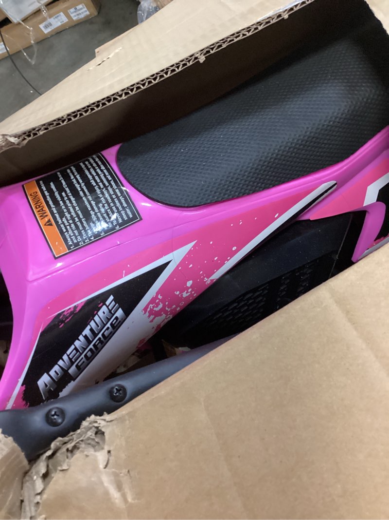 Condition photo showing As Is for adventure force 12v electric dirt bike, kids battery powered ride on, ages 5 years and up, pink