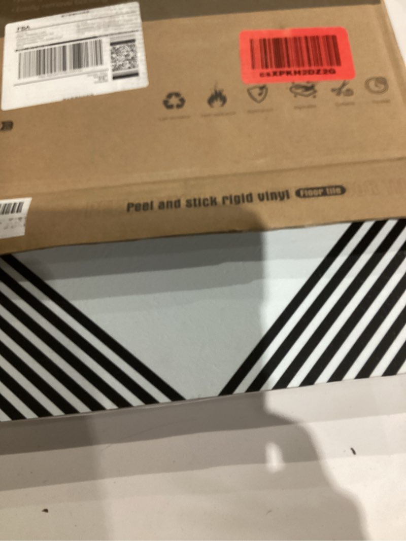 Condition photo showing Good Condition for WOWSTAR 30-Pack Peel and Stick Floor Tiles, 12 x 12in Vinyl Flooring Tiles, Self-Adhesive Waterproof Flooring Planks for Kitchen, Dining Room, Bedrooms, 30 Sq. Ft - Linear Pattern 12in x 12in Black 30