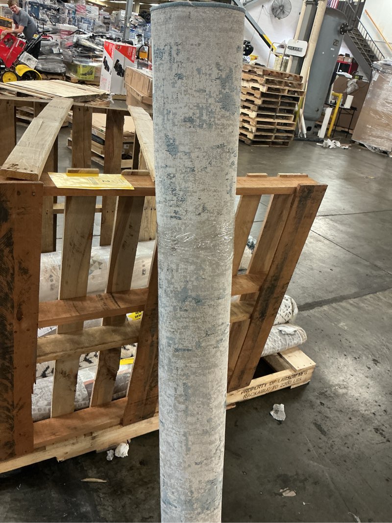 Condition photo showing As Is for origin 21 with stainmaster quatro 5 x 8 (ft) blue indoor abstract area rug