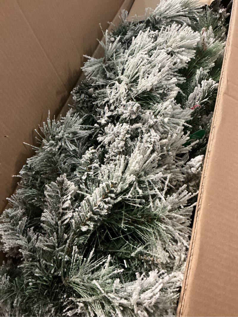 Condition photo showing Good Condition for Puleo International 6.5ft Pre-Lit Flocked Portland Pine Pencil Christmas Tree with 300 Clear Lights, 410 Realistic Dense Snow Flocked Branch Tips, Easy Setup Artificial Trees with Sturdy Metal Stand 6.5' Flocked Portland Pine 300 Clear Lights