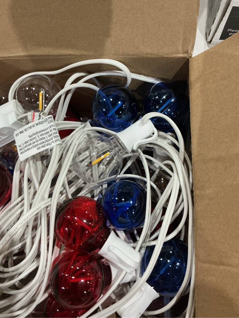 Condition photo showing Good Condition for sunsgne 4th of july decorations g40 led outdoor string lights, 50ft globe string lights with 25 led red white and blue lights for patriotic memorial day decor, e12 socket base, white wire clear red white blue 50ft