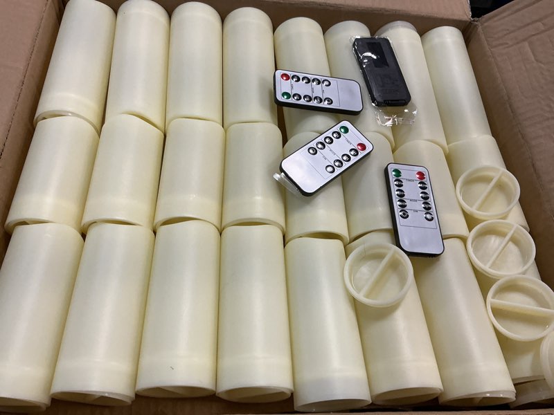 Condition photo showing As Is for set of 96 waterproof outdoor flameless candles, led candles with 4 remote and timer,(h 4" 5" 6" x d 2.2"),for halloween wedding festival 96pack-ivory