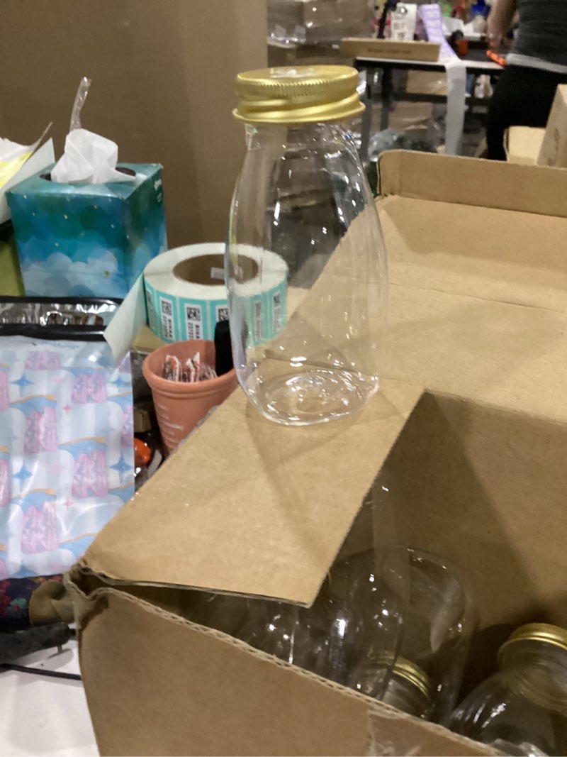 Condition photo showing New/Like New for **incompete** (missing 2 bottles)roshtia 30 pack 4oz 120ml plastic mini milk bottles bulk juice shot bottles with lids small beverage drink containers for restaurants desserts milk iced milkshakes homemade (gold)