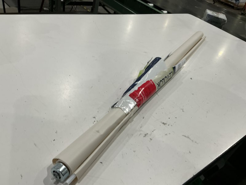 Condition photo showing As Is for levolor 37-in x 72-in cream light filtering cordless roller shade