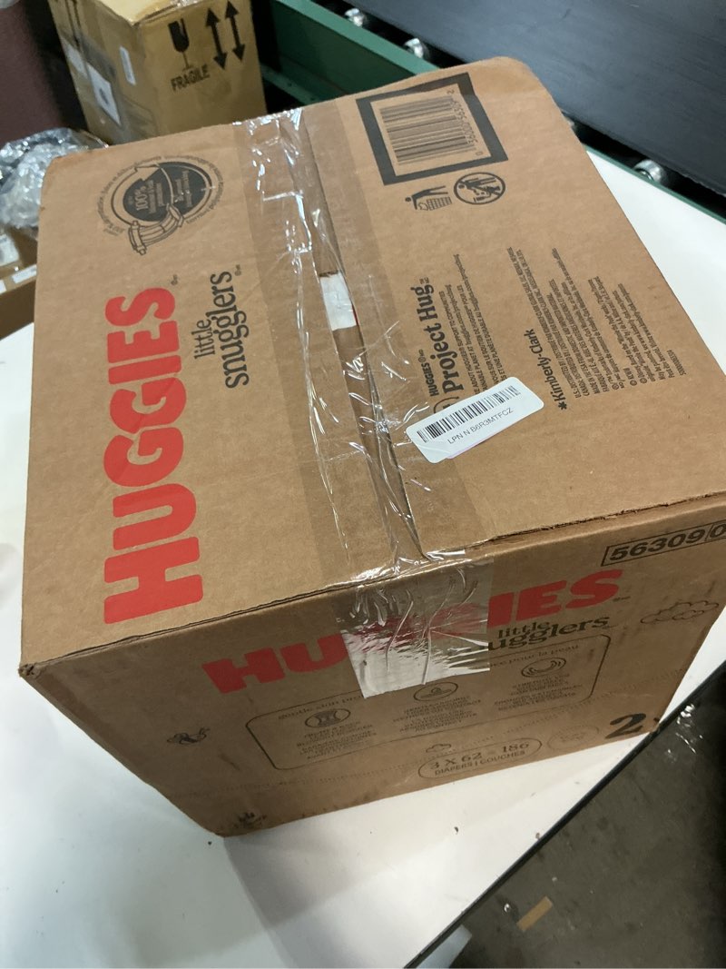 Condition photo showing New/Like New for huggies size 2 diapers, little snugglers baby diapers, size 2 (12-18 lbs), 186 count (3 packs of 62), packaging may vary