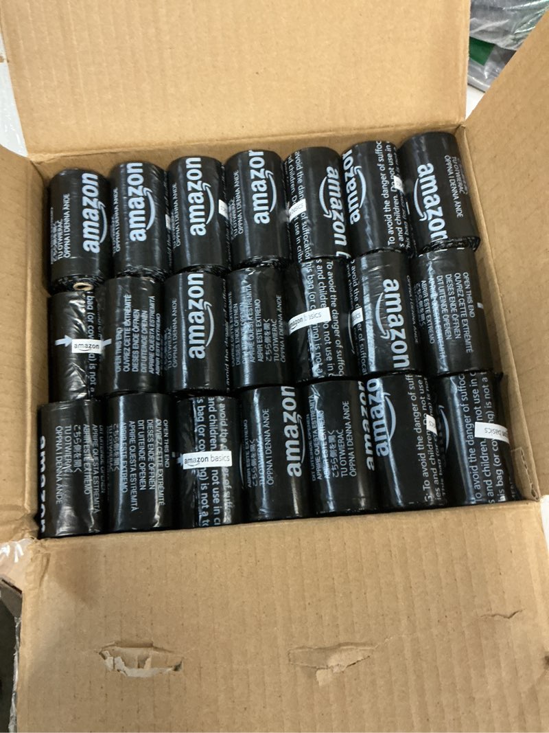 Condition photo showing New/Like New for Amazon Basics Dog Poop Bags with Dispenser, 900 Count, Enhanced for Guaranteed Leakproof, Unscented, Includes Leash Clip