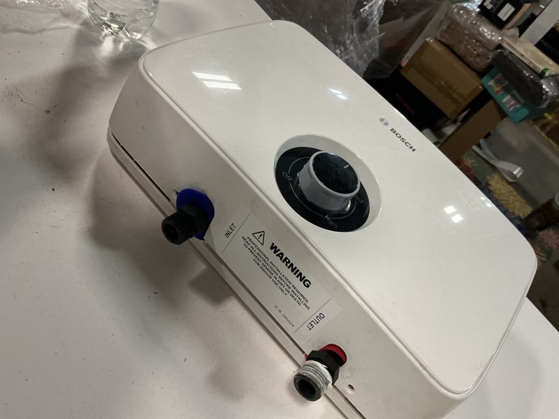 Condition photo showing As Is for Tronic 4000C-10 Under Sink Electric Tankless Water Heater