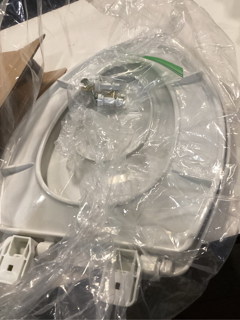 Condition photo showing As Is for Mayfair Little2Big? Elongated Plastic Toilet Seat in White with STA-TITE? Seat Fastening System? and Whisper•Close? Hinge