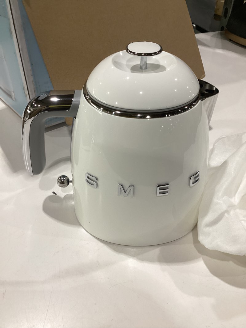 Condition photo showing Good Condition for smeg mini 50's retro style 3 cup electric kettle with double wall anti slip base and water level indicator (white) 0.8 quarts white, not tested