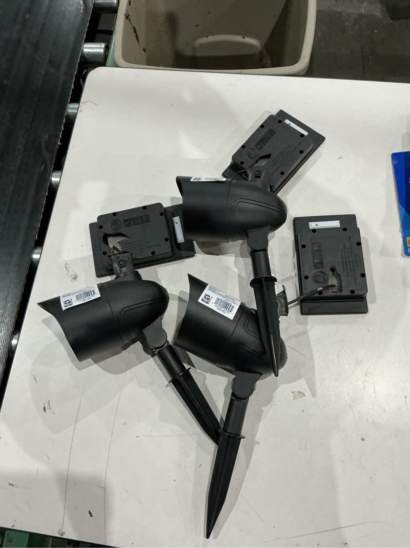 Condition photo showing As Is for harbor breeze 120 -lumens 0.82 -watt black color changing solar led flood light