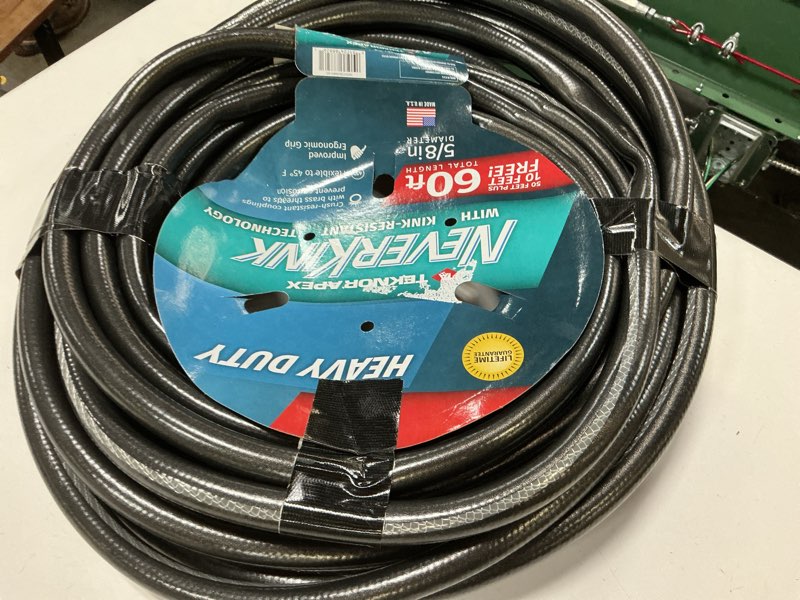 Condition photo showing As Is for neverkink teknor apex 5/8-in x 60-ft heavy-duty kink free vinyl gray coiled hose