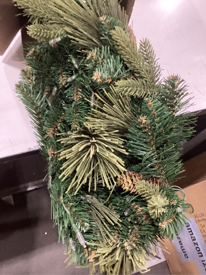 Condition photo showing New/Like New for national tree company 9 ft pre-lit carolina pine artificial christmas garland, christmas decoration with pinecones, 100 warm white led lights, 240 tips, timer, green battery operated tree