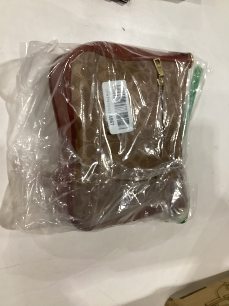 Condition photo showing Good Condition for coach coated canvas signature chaise crossbody tan/rust one size