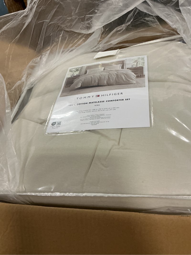 Condition photo showing Good Condition for tommy hilfiger - king comforter set, soft textured cotton matelassé bedding, medium weight for year round comfort, 3 piece bed set with matching pillowcases (monogram beige) king monogram matelassé beige