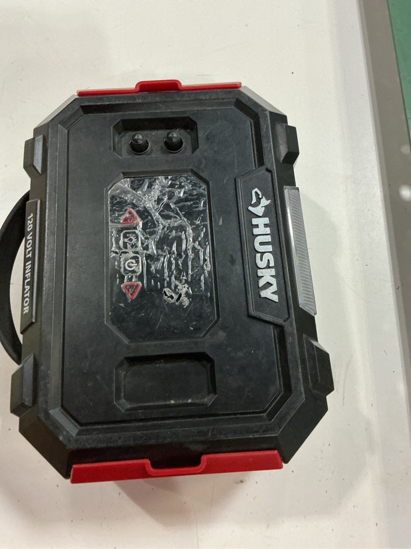 Condition photo showing As Is for husky 12/120v home & auto inflator w/ auto shutoff model 1009 703 736
