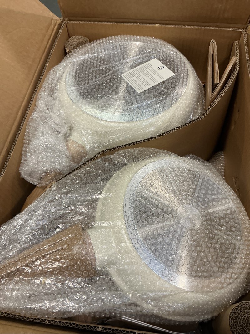 Condition photo showing Good Condition for CAROTE 21Pcs Pots and Pans Set, Nonstick Cookware Sets, White Granite Induction Cookware Non Stick Cooking Set w/Frying Pans & Saucepans(PFOS, PFOA Free) Cream White 21 Piece