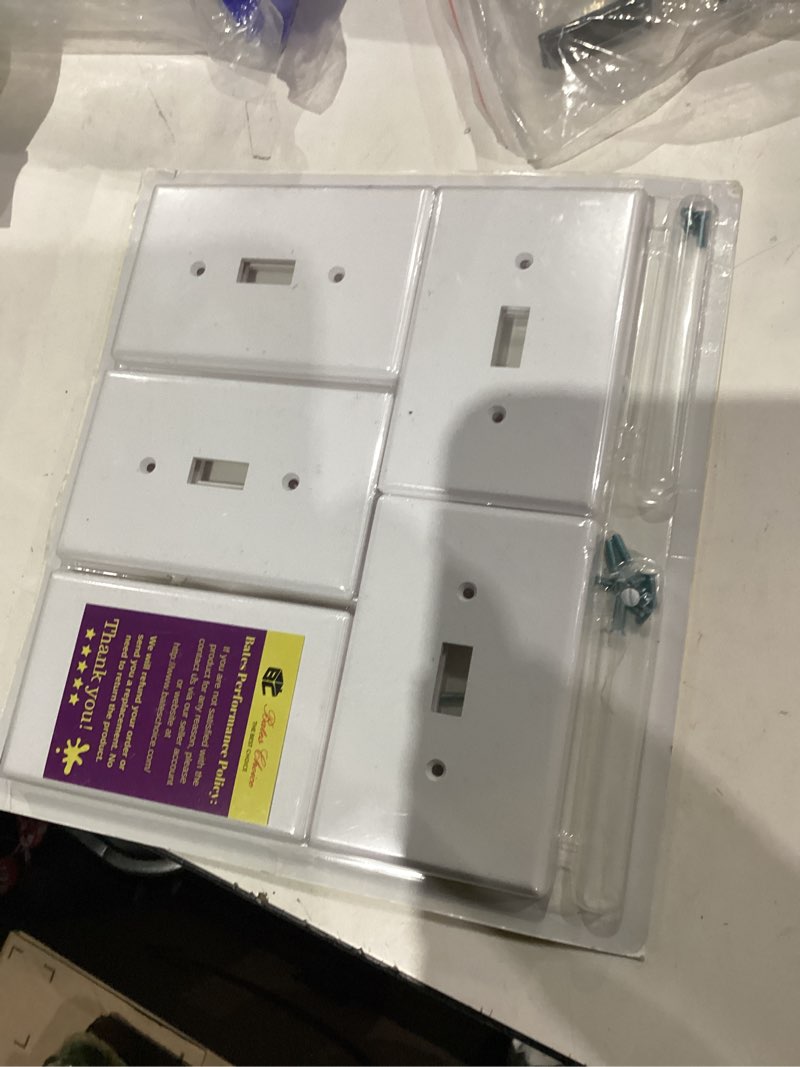 Condition photo showing As Is for Bates- Light Switch Plates, 10 Pack, 4.88" x 3.11", Mid- Size White Light Switch Cover Plate, Light Covers for Light Switch Plate, Light Plates Switch Covers, Toggle Switch Cover, Outlet Plate Cover 10 Pack, Mid-Size White
