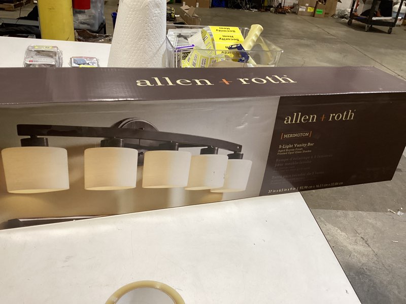 Condition photo showing New/Like New for allen + roth 5-light merington aged bronze standard bathroom vanity light