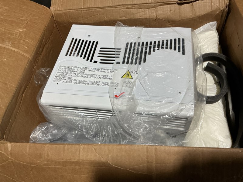Condition photo showing As Is for ge window air conditioner unit, 6,000 btu for small rooms up to 250 sq ft. with adjustable fan and cooling settings, perfect for small bedroom or living room, easy install kit included, white new 6,000 btu electronic controls white