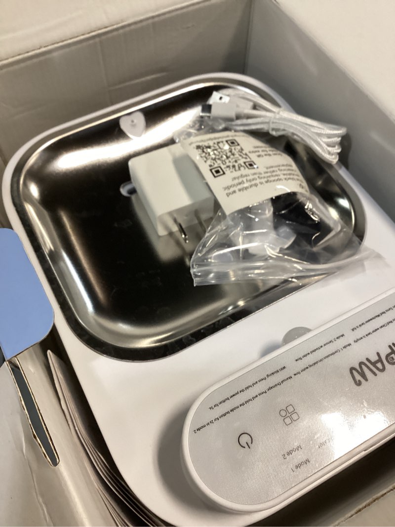 Condition photo showing As Is for cat water fountain
