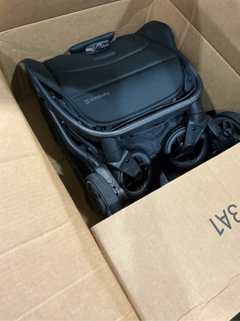 Condition photo showing Good Condition for uppababy minu v3 travel stroller | lightweight + compact design | one-hand fold + unfold | from birth + overhead compatible | jake (charcoal/carbon frame/black leather)