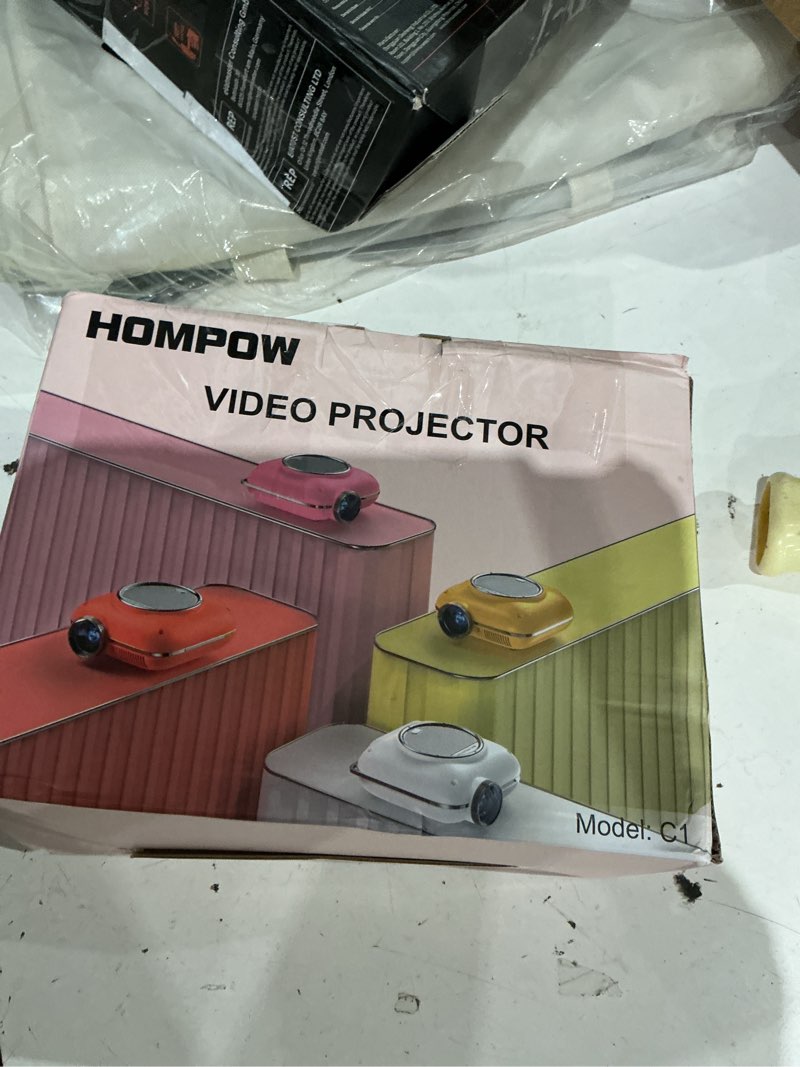 Condition photo showing As Is for hompow mini projector with two -way bluetooth, portable projector for home theater use, support 1080