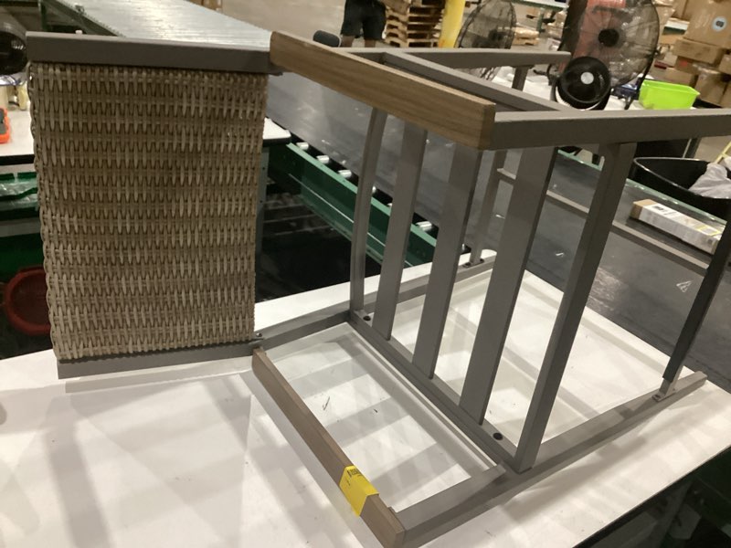 Condition photo showing As Is for dorsey  wicker gray steel frame stationary counter-height chair with