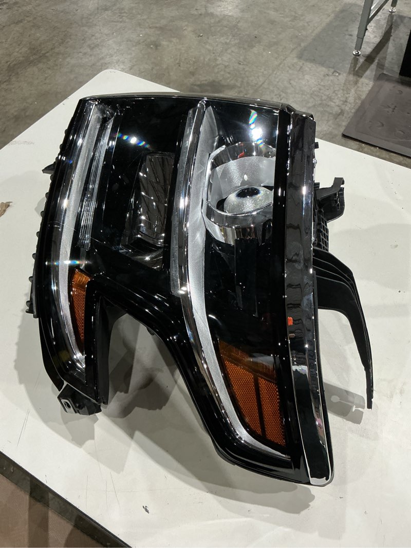 Condition photo showing Good Condition for fione headlight compatible with chevy tahoe/suburban 2015-2020 drl halogen headlamp not hid black housing left driver side lh w/o bulbs