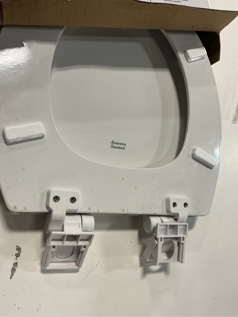 Condition photo showing As Is for american standard bedminster wood white round soft close toilet seat