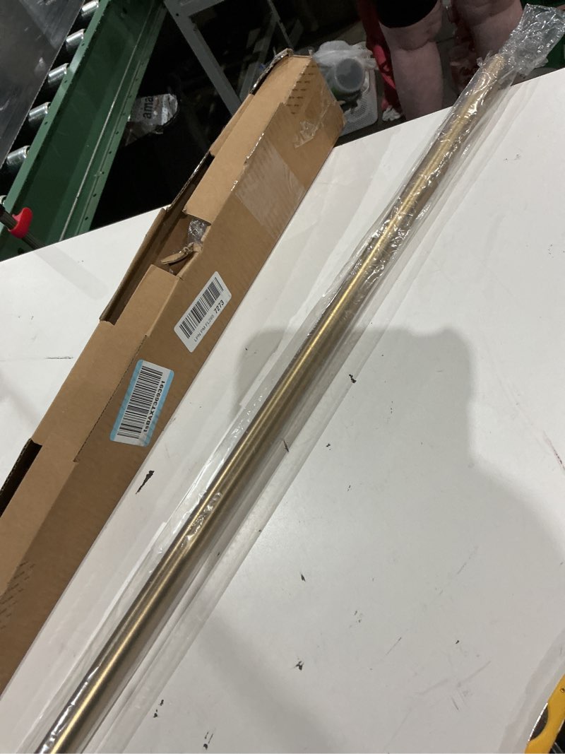 Condition photo showing As Is for (similar to not exact jyafex curtain rods 32-118 inch, heavy duty 1 inch adjustable curtain rod for windows, gold long window treatment rods, modern design, easy installation 32\" to 118\" gold