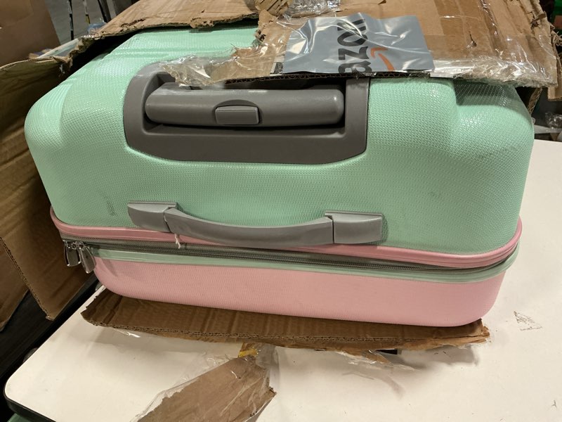 Condition photo showing As Is for ( color pink & green )rockland melbourne hardside expandable luggage with spinner wheels, checked large 28\"