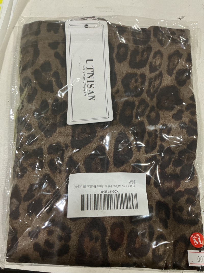 Condition photo showing New/Like New for UTNISAN Women's Leopard Suede Skirt Mid-Rise Waist Cowgirl-Chic Fringe Stretch Bodycon Mini Skirts Medium Leopard