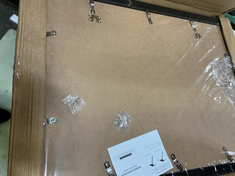 Condition photo showing As Is for 19.25x26.75 picture frame for wall display, 19.25x26.75 black picture frame with shatter resistant plexiglass, stable and sturdy puzzle frame for wall display, handpicked gift collection