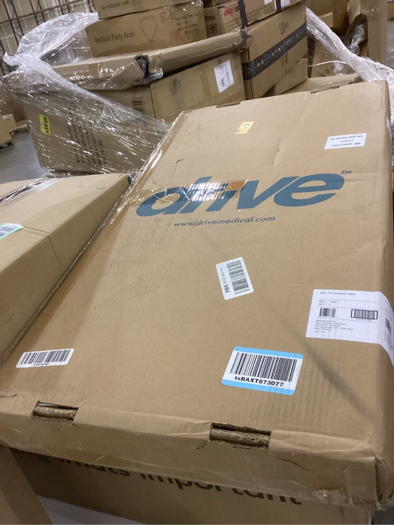 Condition photo showing New/Like New for Drive Medical Overbed Table with Wheels - Secure Height Adjustment for Comfort - Non Tilt Surface - Smooth Rolling Design - Home & Hospital Use - Woodgrain Laminate Top - Silver Vein Silver Vein Table