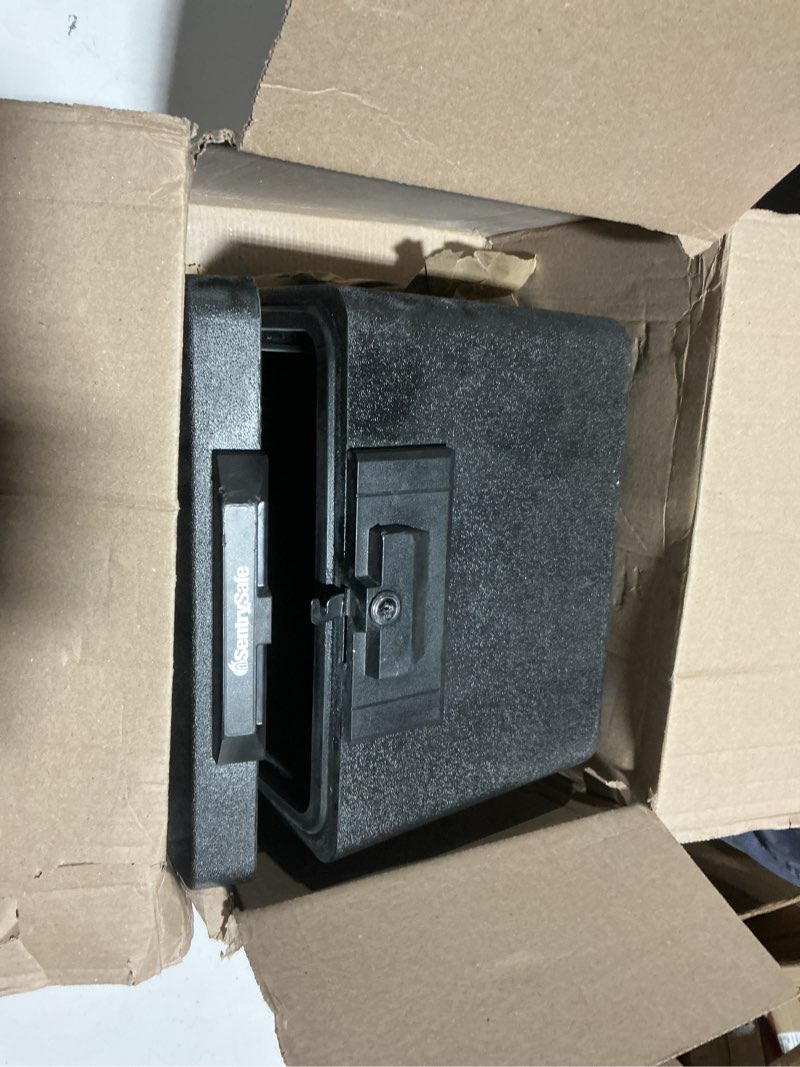 Condition photo showing As Is for SentrySafe Black Fireproof Document Box with Key Lock, Safe Secures Files and Documents for Home or Office, 0.61 Cubic Feet, 13.6 x 15.3 x 12.1 inches, 1170