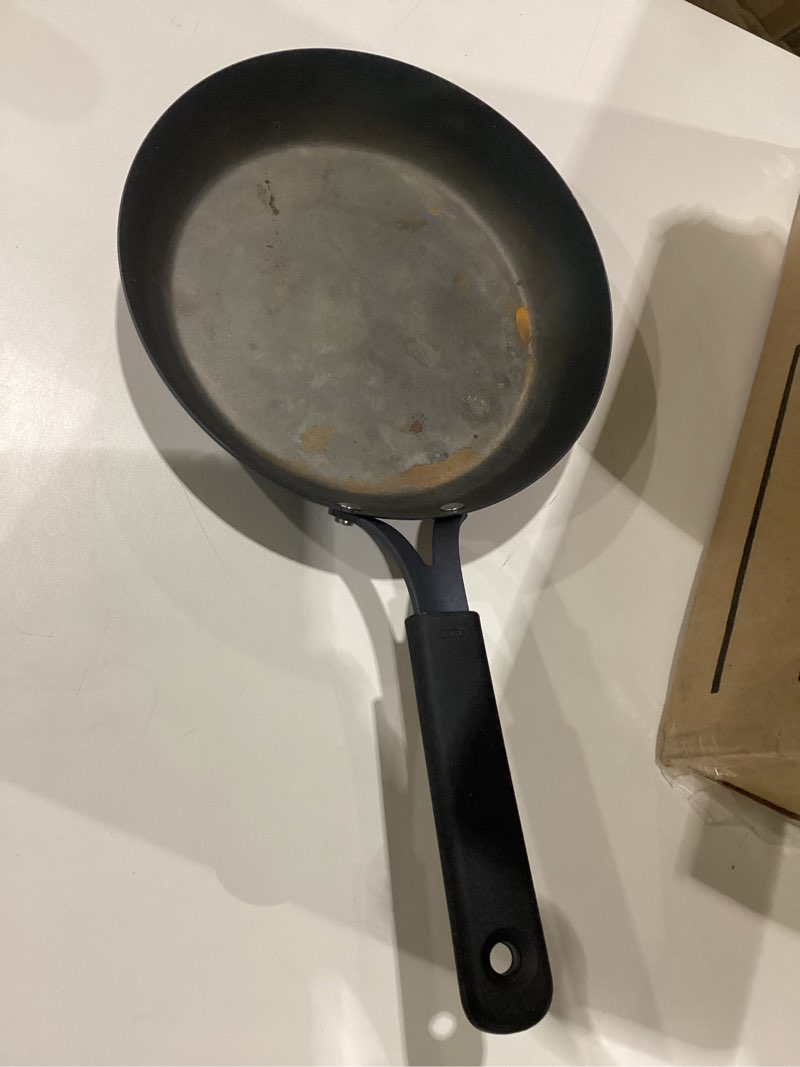 Condition photo showing Good Condition for Dirty OXO Obsidian Pre-Seasoned Carbon Steel, 10\" Frying Pan Skillet with Removable Silicone Handle Holder, Induction, Oven Safe, Black