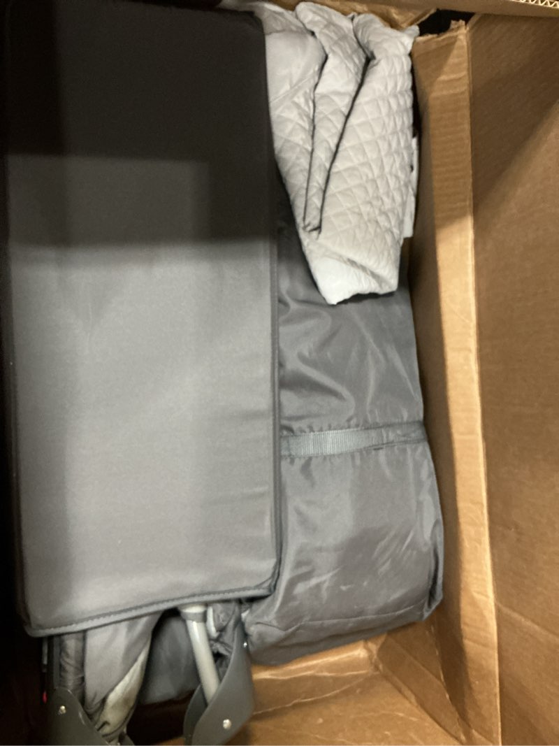 Condition photo showing As Is for 4 in 1 baby bassinet, pack and play, bedside crib sleeper, diaper changer - comes with mattress, mosquito net, bottom storage and toy bar for newborn to toddles grey